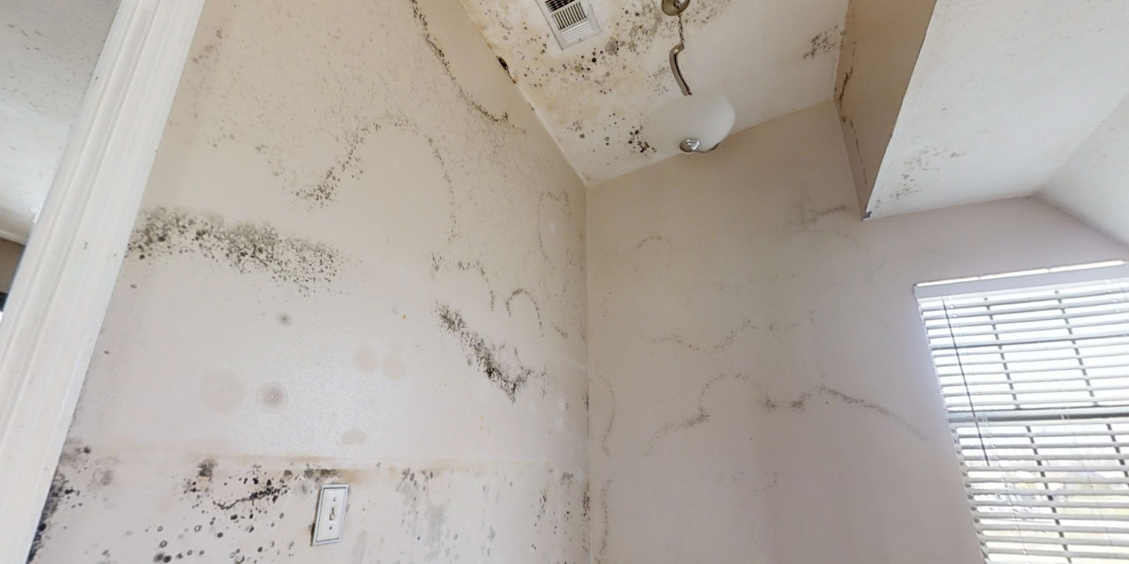 The dirty wall of the house Water Damage Restoration in Asheville, North Carolina